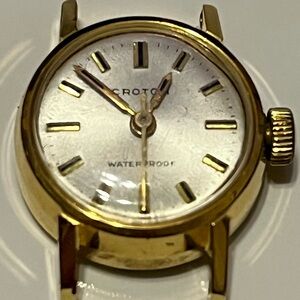 Croton Waterproof Woman’s Swiss Gold Tone Pearl Dile Small Watch